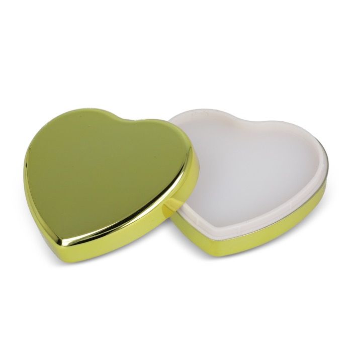 Baume à lèvres dans un étui métallique en forme de cœur