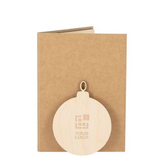 Carte de Noël avec décoration en forme de boule et des graines de pin