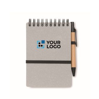 Carnet avec stylo à encre bleue et bande élastique, pages lignées