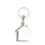 Porte-clés métal en forme de maison avec papier inséré à l'intérieur