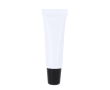 Baume à lèvres crème dans tube blanc avec capuchon coloré, SPF 15 couleur noir