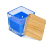 Bougie en cire végétale dans un pot en verre avec couvercle en bambou couleur bleu