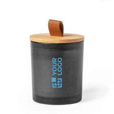 Bougie dans un pot en verre coloré

