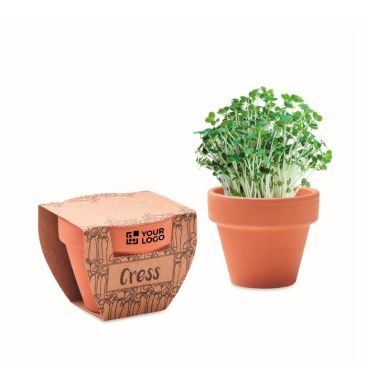 Pot en terre cuite, graines de cresson et pastille de terre vue avec zone d'impression