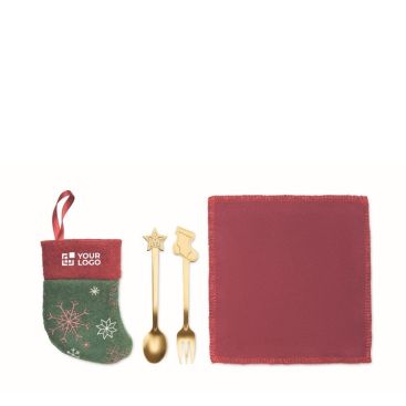 Set de couverts et serviette pour dessert dans une botte de Noël