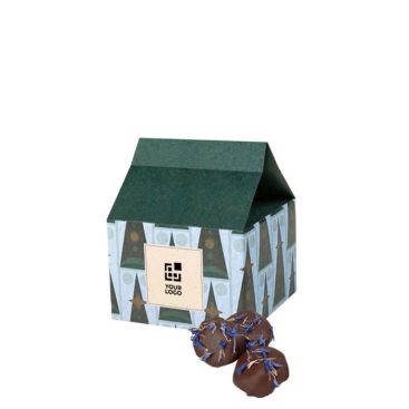 Petite maison de Noël avec bonbons de prunes enrobées de chocolat vue principale