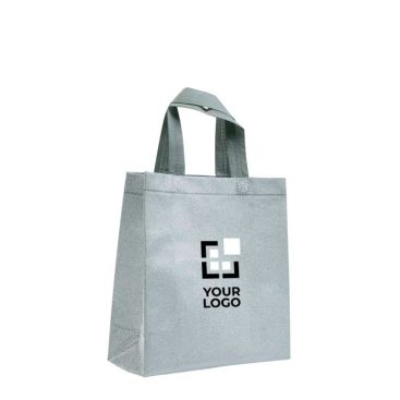 Sac en non-tissé brillant avec paillettes et poignées 130 g/m² avec zone d'impression