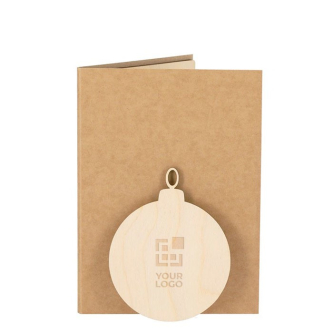 Carte de Noël avec décoration en forme de boule et des graines de pin