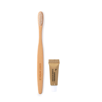 Brosse à dents en bambou et dentifrice dans une boîte en carton