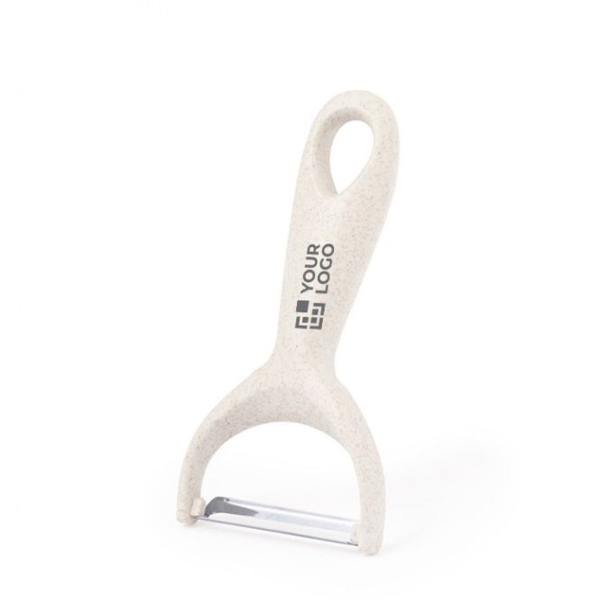 Éplucheur manuel à manche ergonomique et trou de suspension