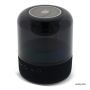 Enceinte bluetooth noire portable de forme circulaire